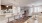a large living room with a large dining table and chairs
