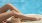 a person lying on a beach