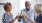 a few people toasting wine glasses