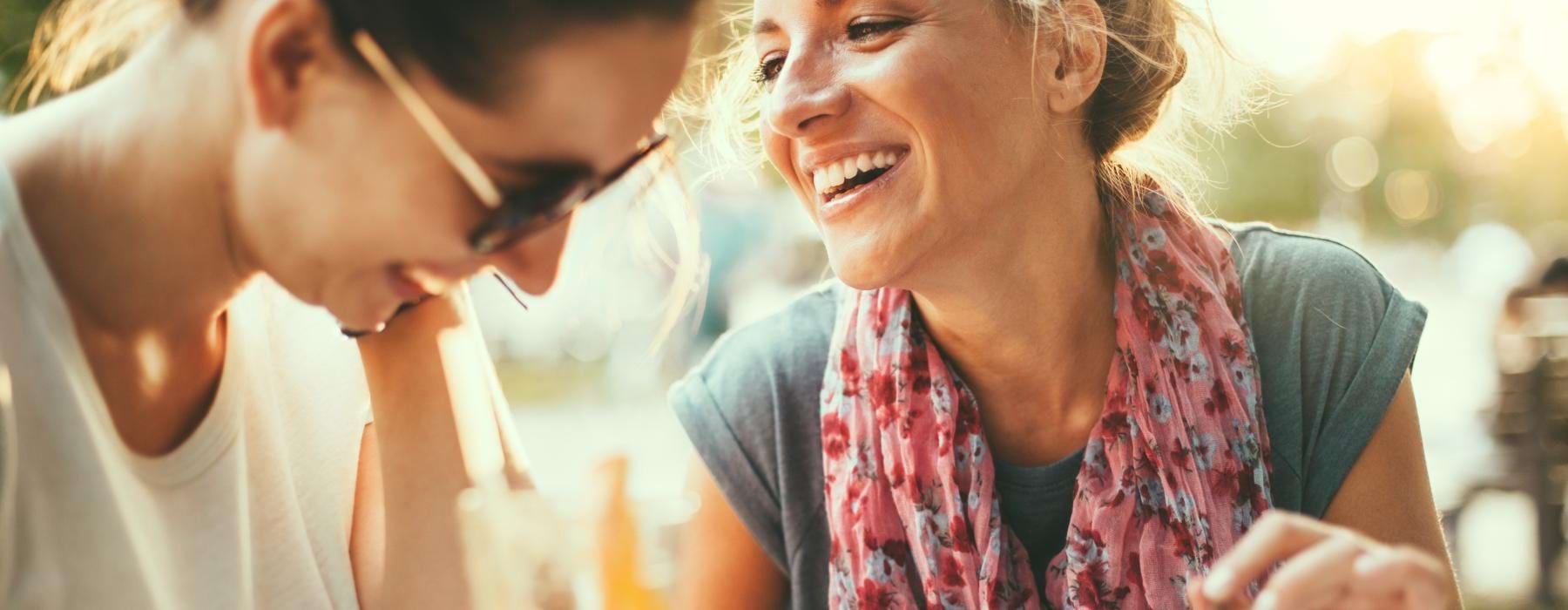two women laughing